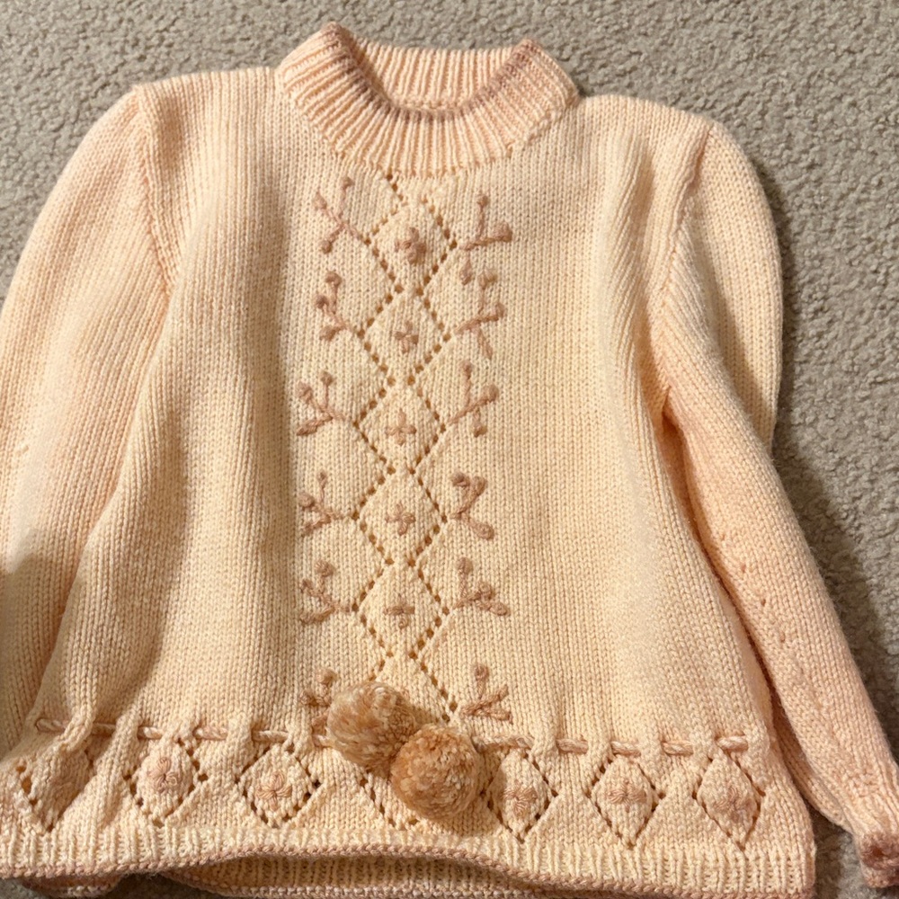 Elegant Cream Sweater with Pom Pom Detail
